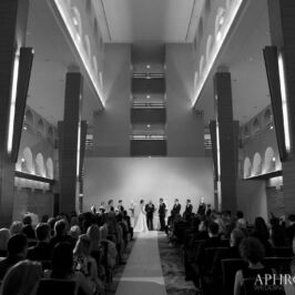 Ceremony at the Marriott Long Wharf. Two pedestals with cylinder vases on each side.